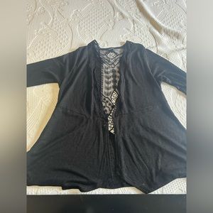 Brand new Michael Kors blouse with a beautiful back to it.